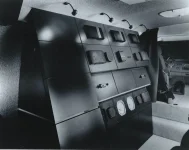 stereo cabinet and steering wheel.webp