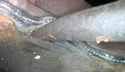 Oil tube between block and manifold.webp